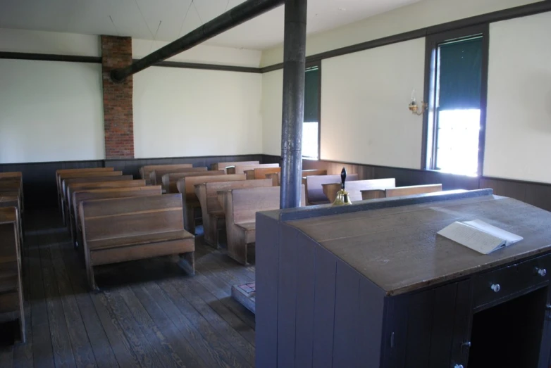 empty chairs in a church with wood floors