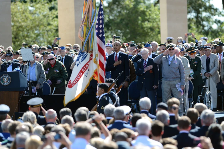 some people in uniform and others with flags