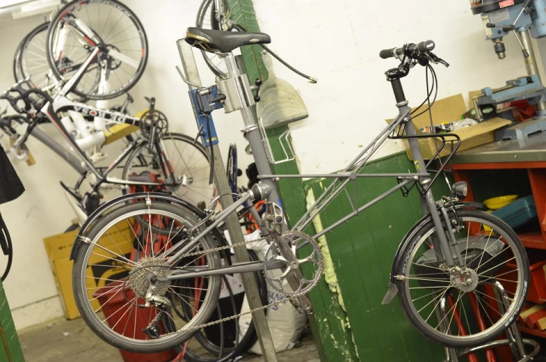 two bicycle parked next to each other in a garage