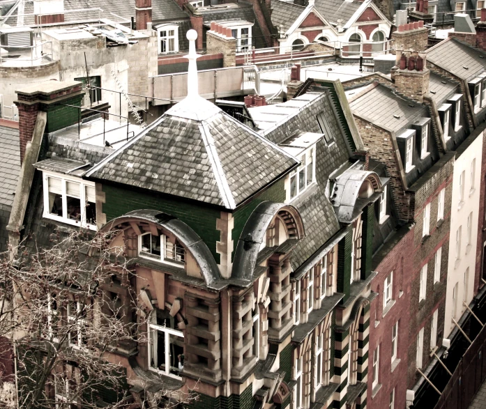 the top of a building with many windows