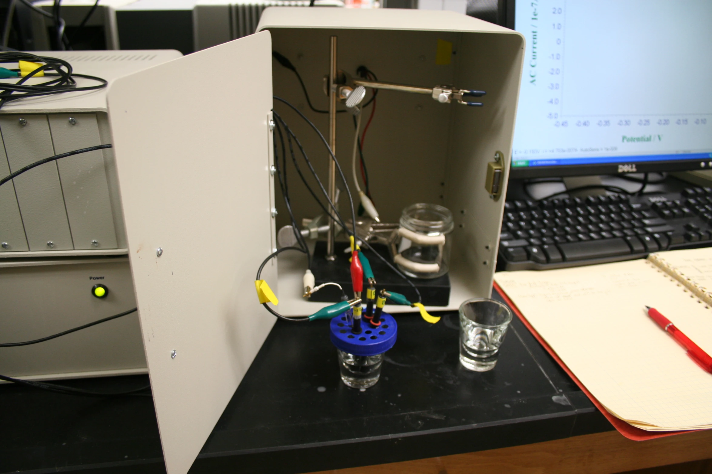 an electronics box sitting on top of a wooden desk