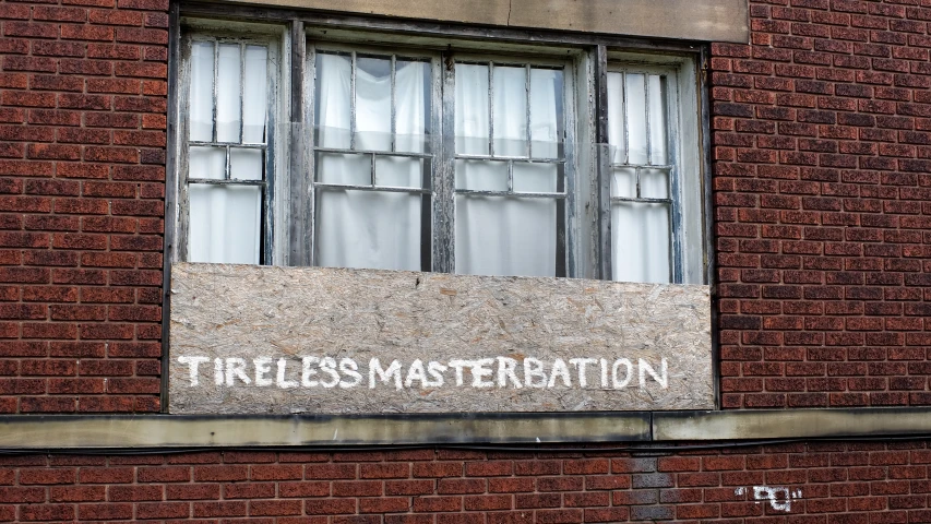a sign that is on the side of a building