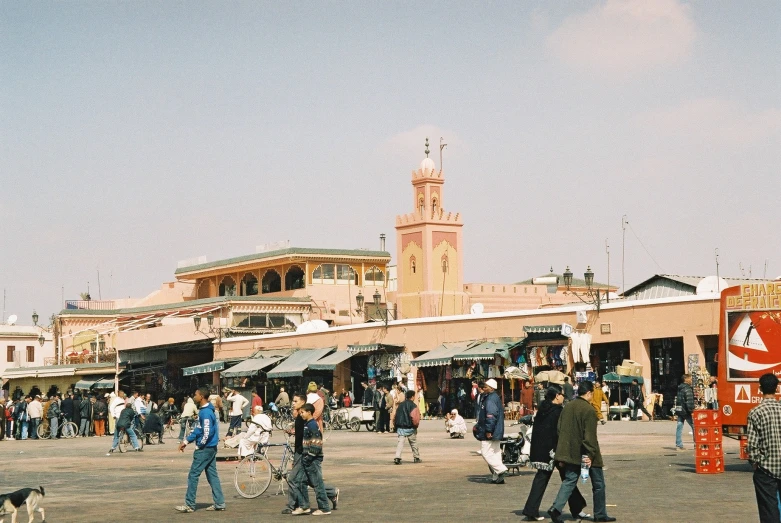 a street scene with a crowd of people