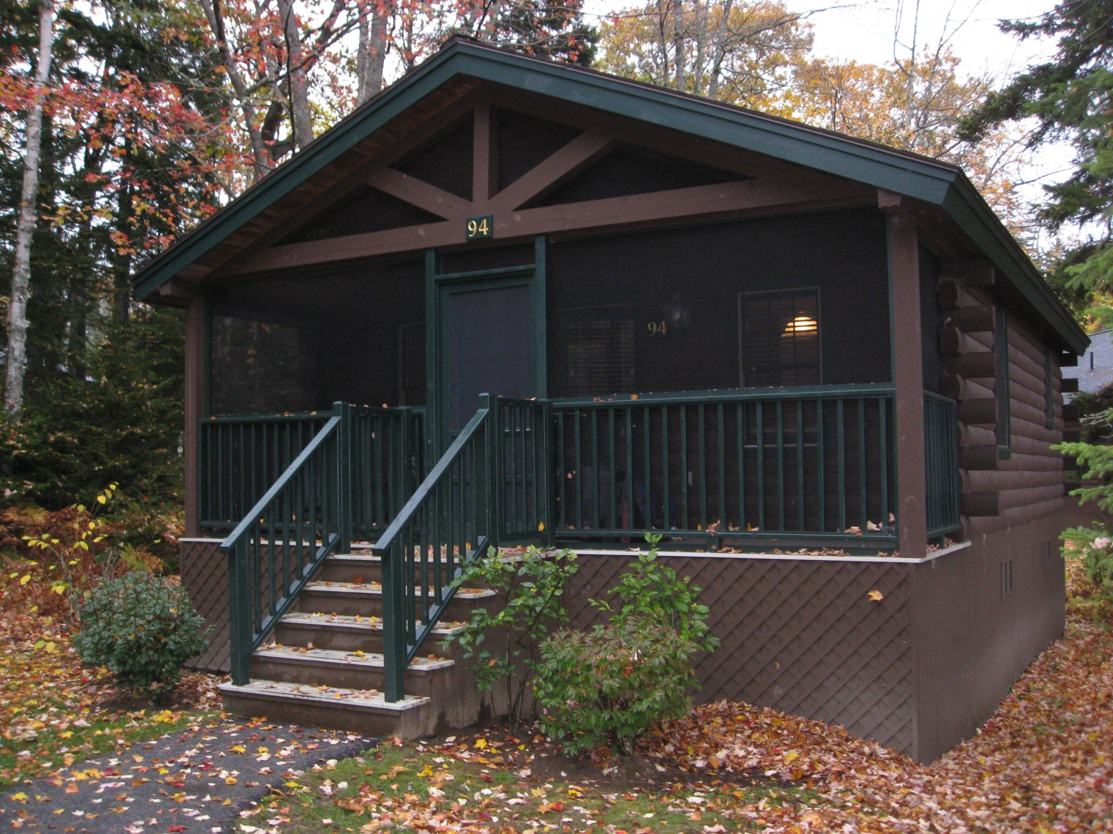 a cabin that is built in the woods