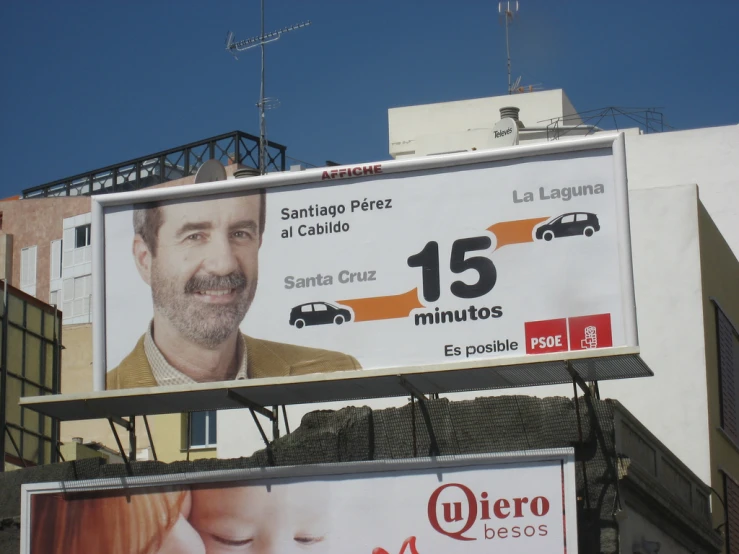 a billboard advertising a man and woman in spanish