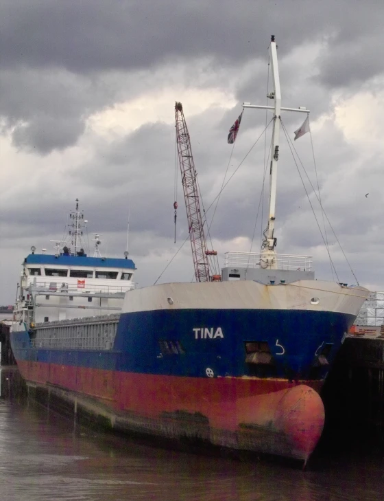 the large blue and white ship has docked