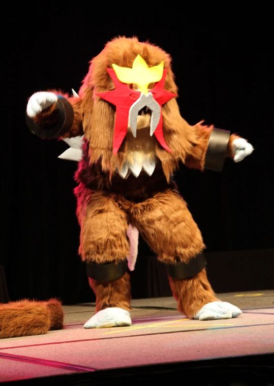 a mascot with a large red head and big red nose