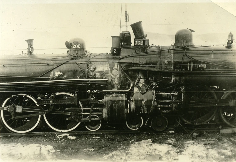 a train is on the train tracks during the day