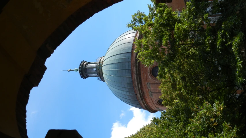 a church is framed by an arched arch