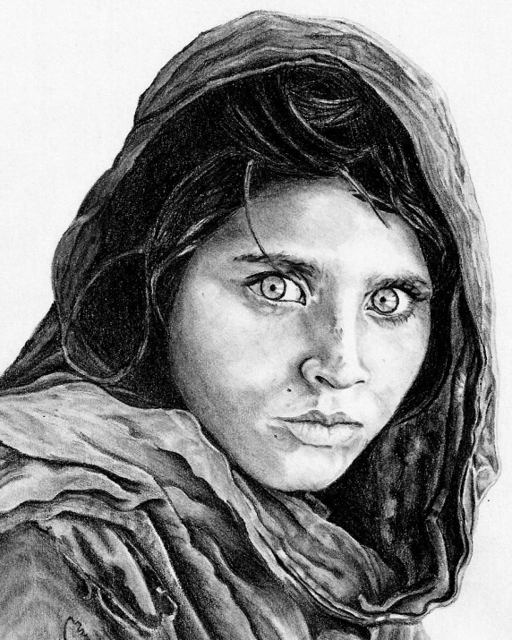 a black and white image of a woman with a scarf on