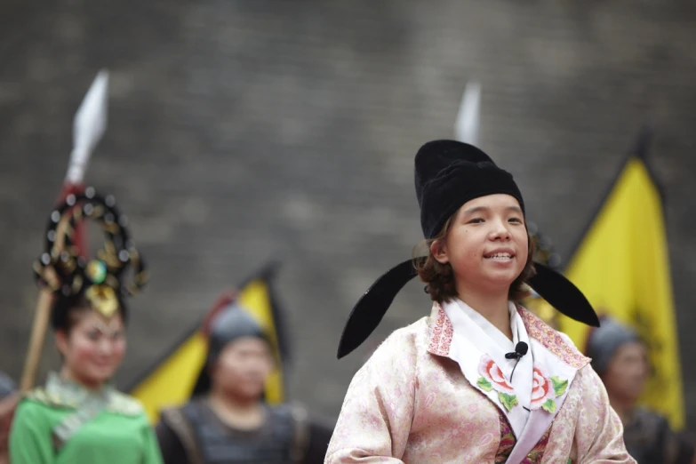 three children are dressed up in costumes for the event