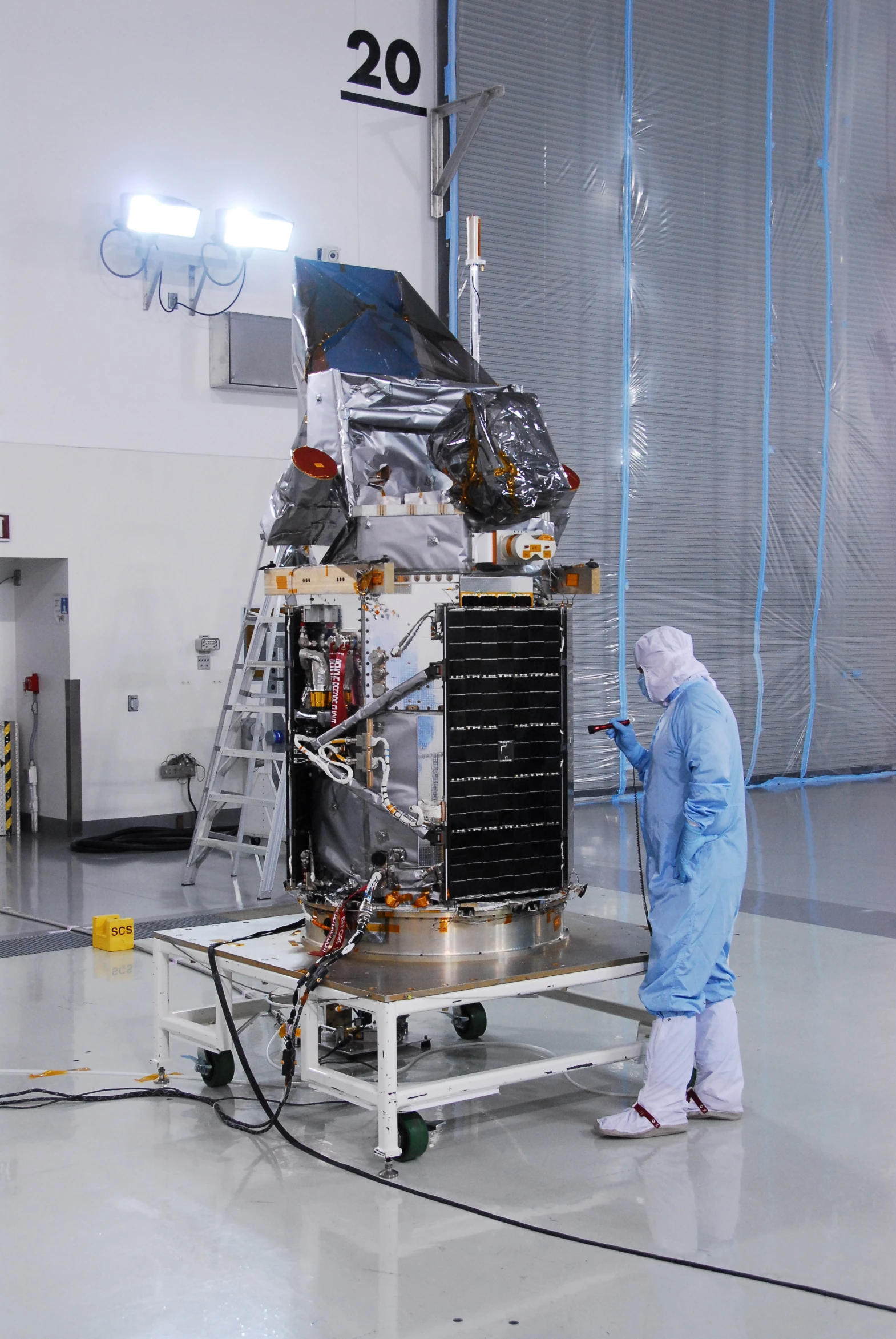 some scifig technicians standing around a space station