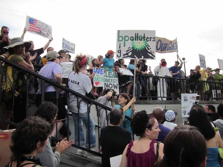 a group of people standing on top of steps