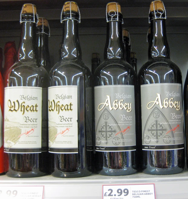 various bottles are displayed on a shelf in a store