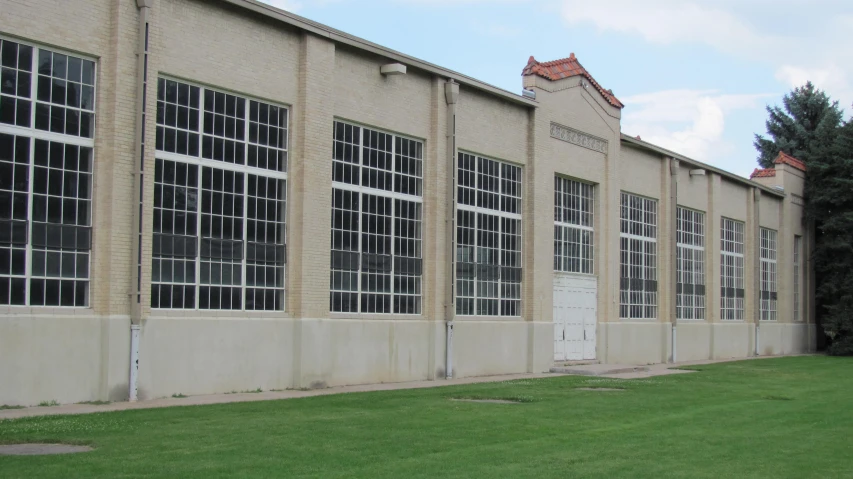 a big building with lots of windows that are outside