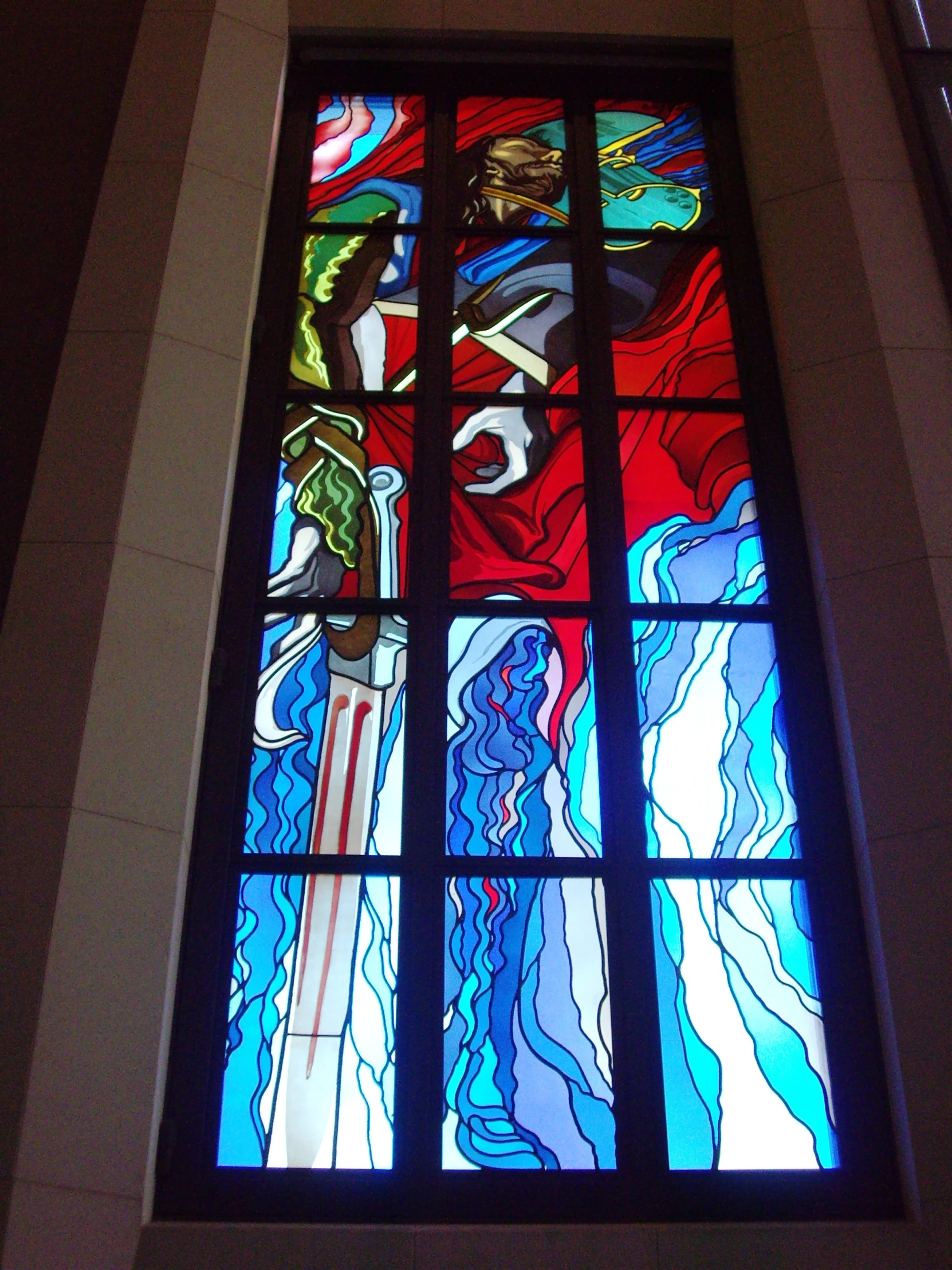 a large window with colorful glass on it