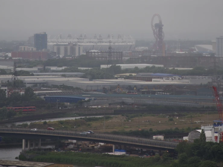 the city skyline in the rain is very populated