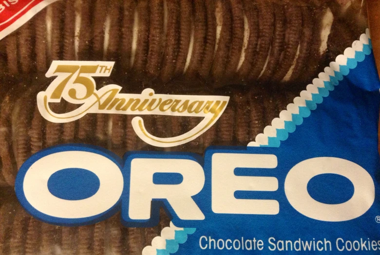 a box of birthday oreo cookies next to some wrappers