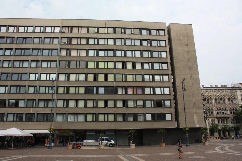 an office building sits empty on a corner street