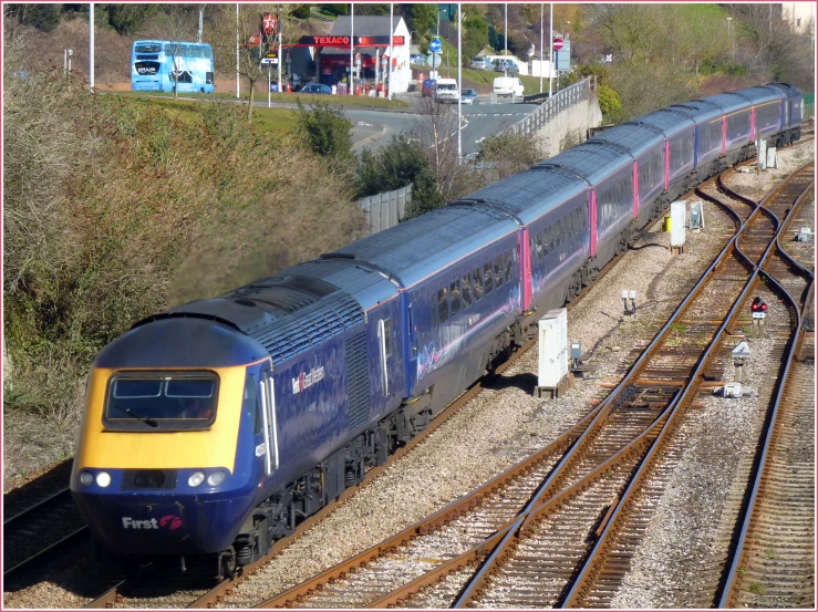 the large train is pulling into the station