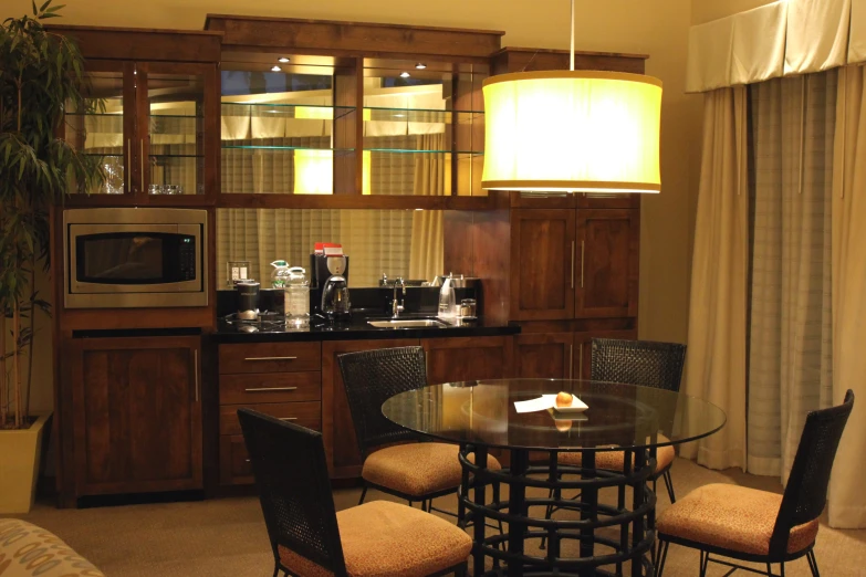 a well lit kitchen with some lights in it