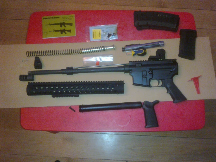 a small rifle and other accessories on display