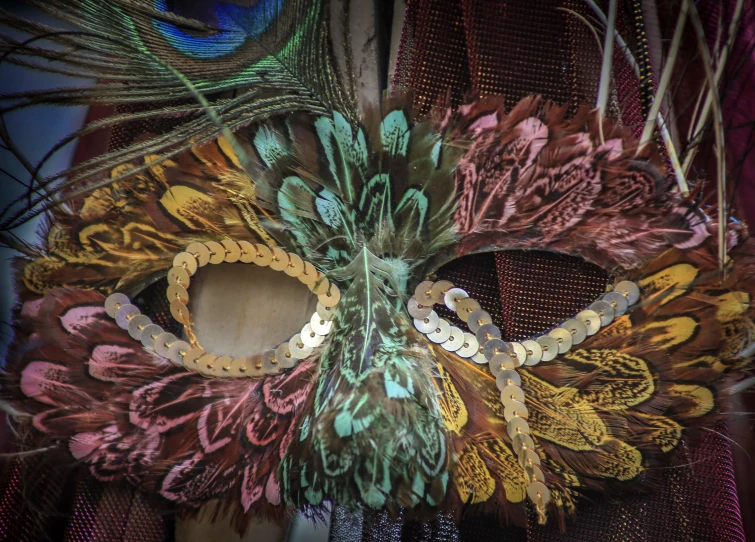 colorful peacock mask, with wirework and sequins