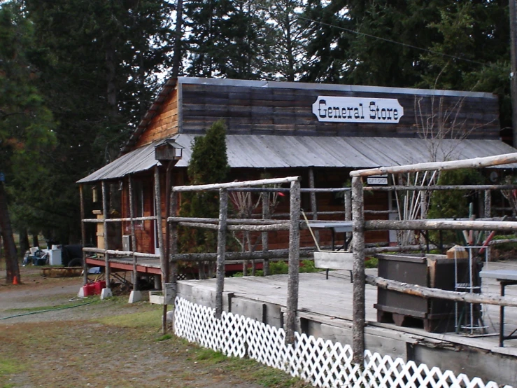 a wooden structure with a sign for a restaurant