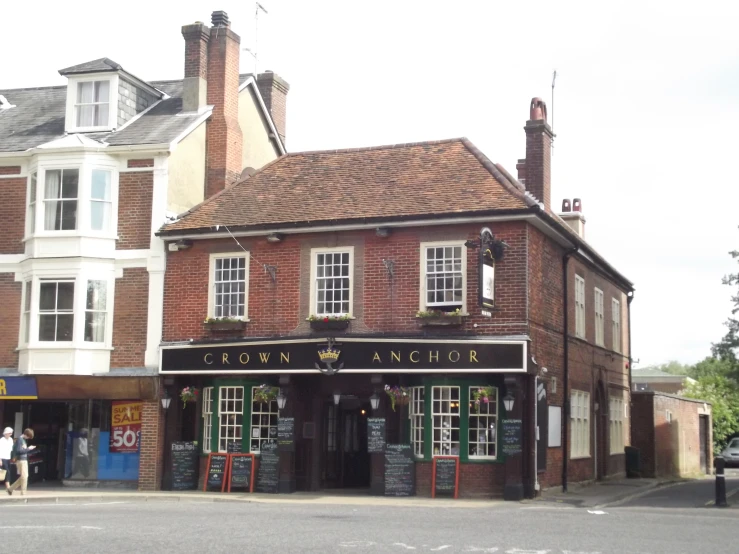 a brick building with many windows and windows