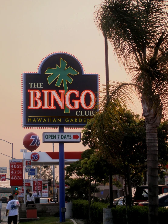 a big sign at the entrance to a local casino