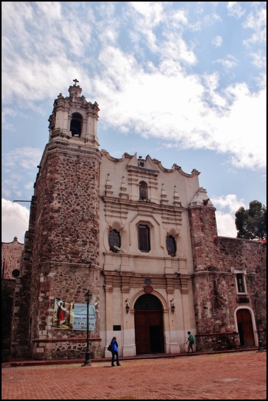 a large building with a clock on the top