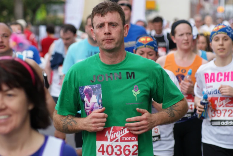 a group of people running in a race