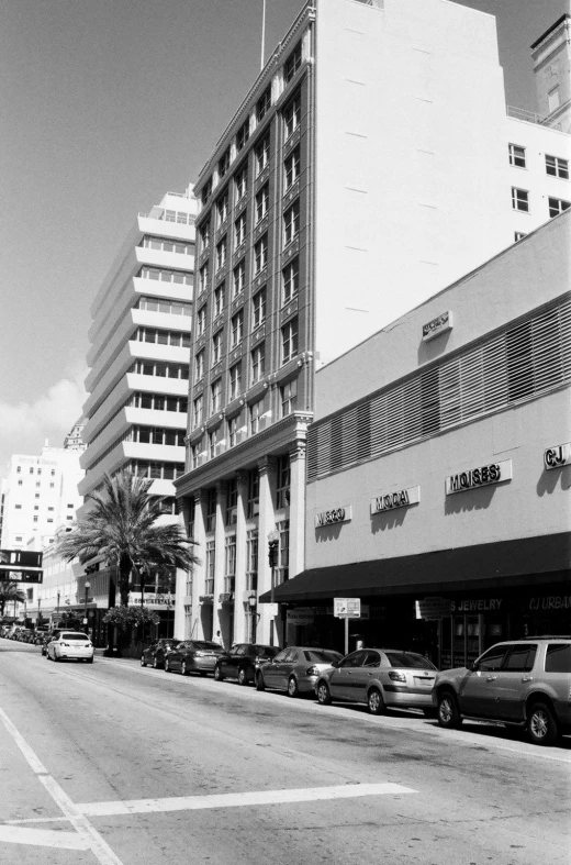 a street scene with some cars parked on it