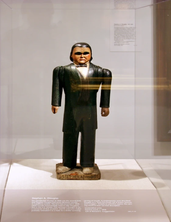 a dummy of aham lincoln on display in glass cases