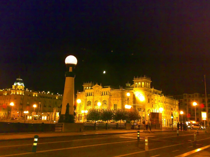 the buildings are lit up with white lights