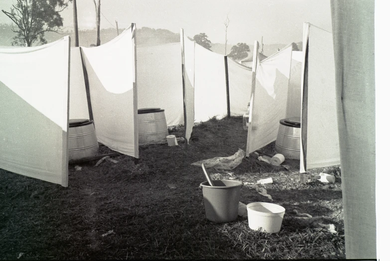 a line of white tents lined up next to each other