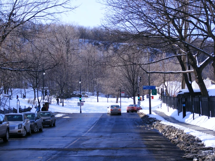 snow covered street with no cars on it