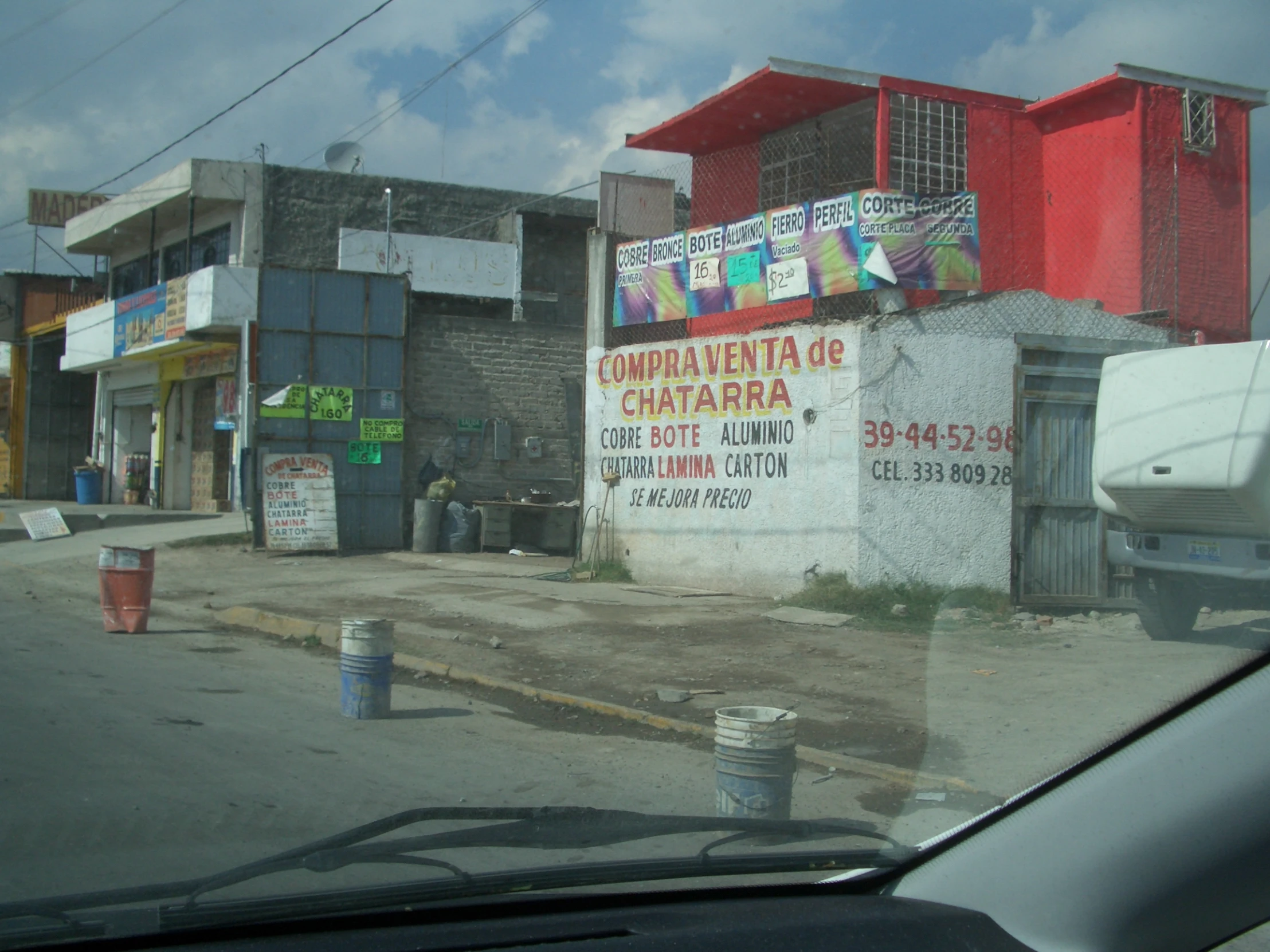 a view through the car window looking at an outside area