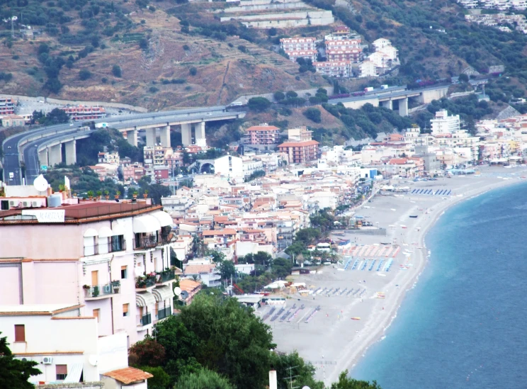 a beach view with lots of houses in the background