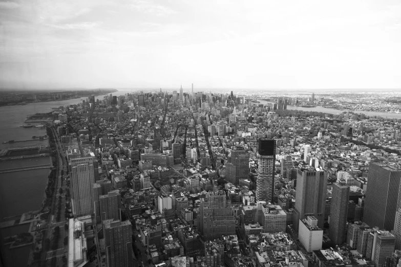 an aerial po of a cityscape, with very high rise buildings