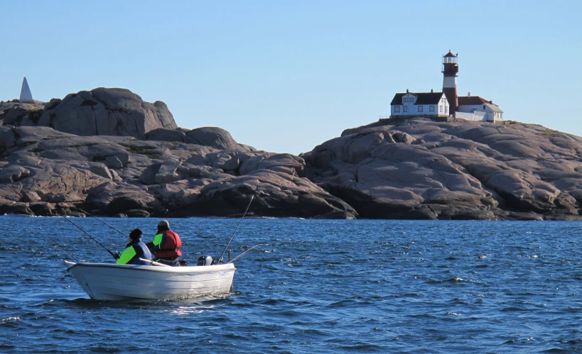 a small boat floating on top of the water