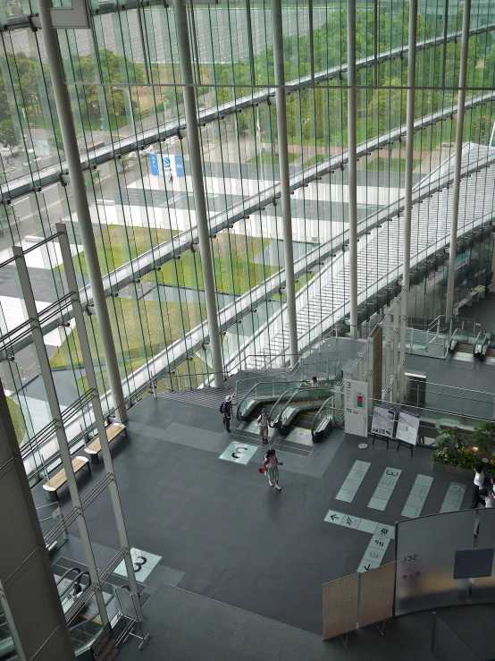 an airport lobby with multiple different passenger airplanes parked