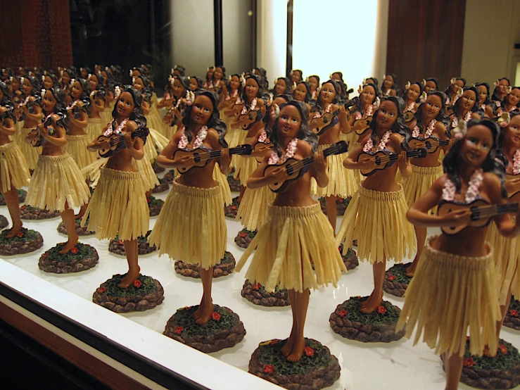 an array of figures playing violin on a table