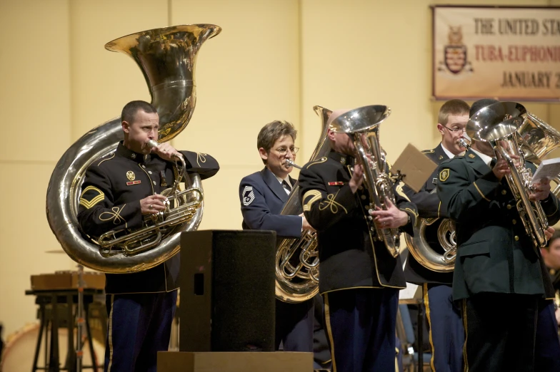 the band is dressed in uniforms and playing musical instruments