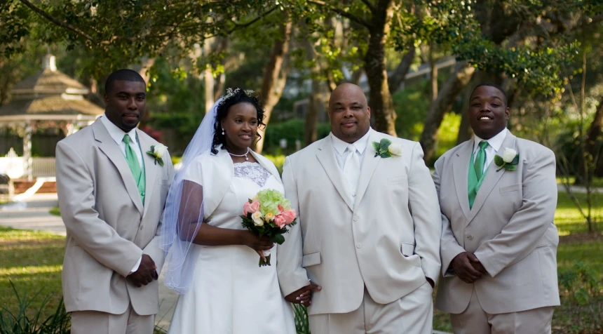 the groom and bride are posing for a picture