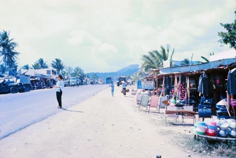 a man walks past the empty street in the town