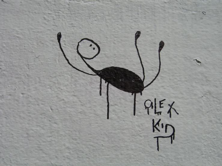 a drawing of a spider crawling down a wall