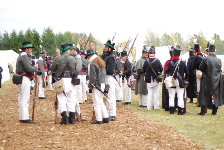 a group of men in uniform standing on a field