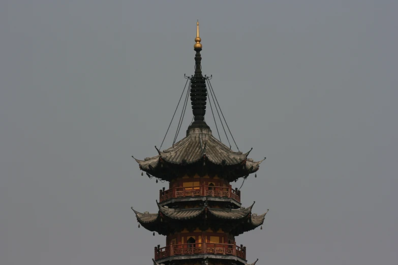 a large building that has some roof top designs on it