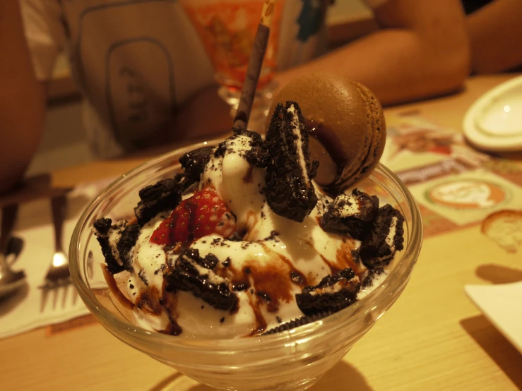 an ice cream dessert in a bowl on a table